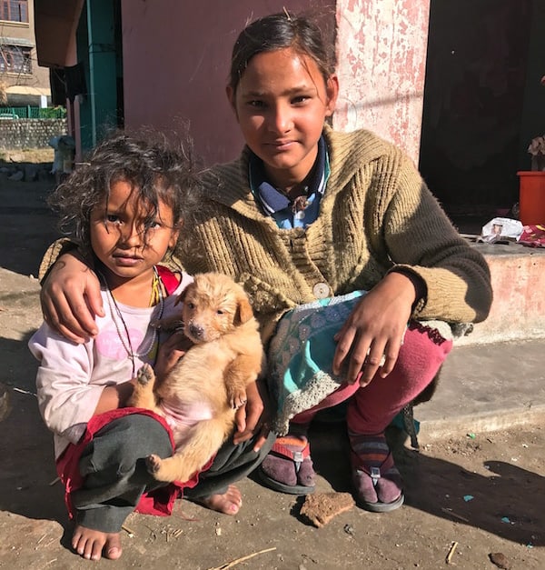 Indian girls, poor, puppy